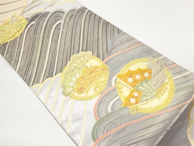 丸文に松・蝶・波模様織出しリバーシブル袋帯